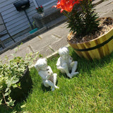 Children holding a can of fireflies - Garden Statue Decoration