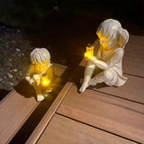 Children holding a can of fireflies - Garden Statue Decoration